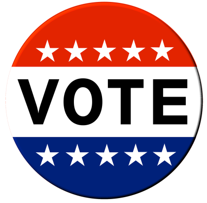 A red white and blue button VOTE