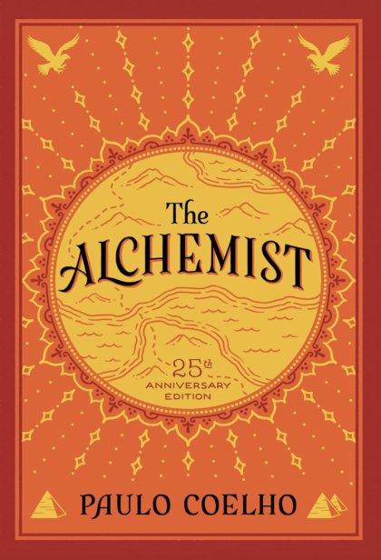 Cover of book The Alchemist with bright yellow and orange patterns